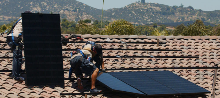 Solar Installers Securing Panels Los Angeles
