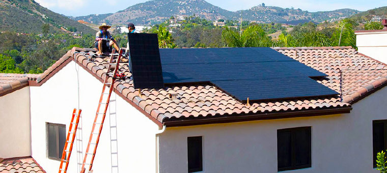 Solar panels installed on tile roof of Southern California home.